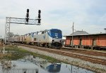 AMTK 4 leads train P092-29 past the signals at Charlie Baker